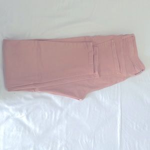Pink mid rise jeans.